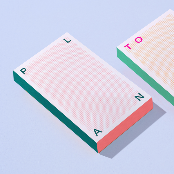 Moglea Grid Pad notepad with a grid layout, featuring a clean white background and subtle grid lines for planning or note-taking.
