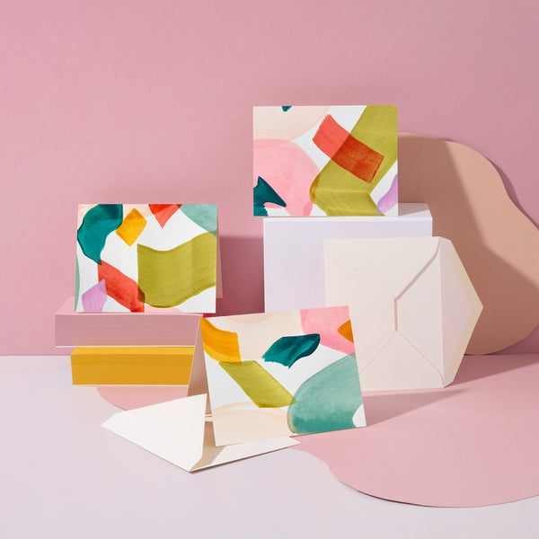 Moglea Calypso Stationery Set featuring colorful notebooks, pens, and accessories on a white background.