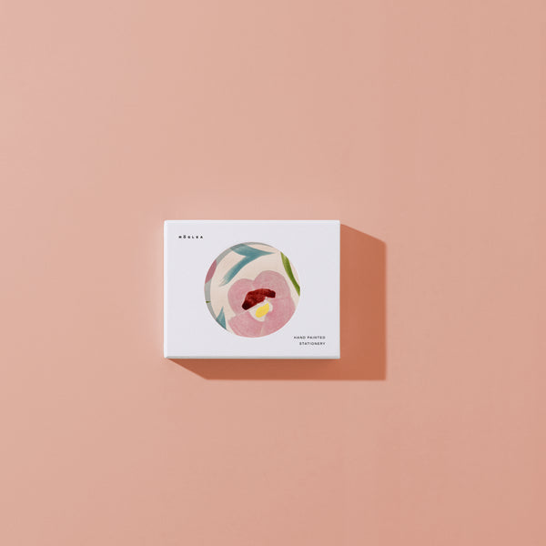 Moglea Anemone Stationery Set with floral patterned paper and matching envelopes on a white background.