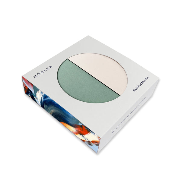 Moglea Nautilus Swirl Pad Mini Set of decorative notepads with spiral patterns and colorful swirl designs on the covers.