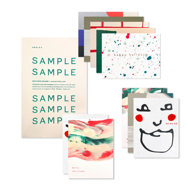 Set of 10 Moglea holiday cards featuring elegant, festive designs perfect for seasonal greetings and celebrations.