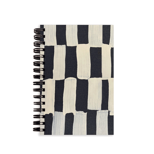 Small A6 notebook by Moglea featuring a surprise second cover design, perfect for jotting notes and creative ideas.