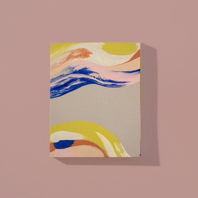 Hand-painted citron folio notebook by Moglea, featuring vibrant watercolor design and textured cover for writing or sketching.