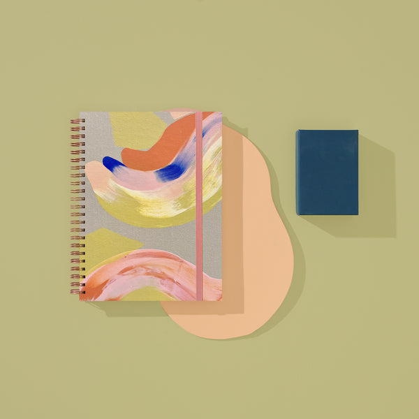Moglea Citron Medium A5 Notebook with soft yellow cover and lined pages, ideal for writing and note-taking.
